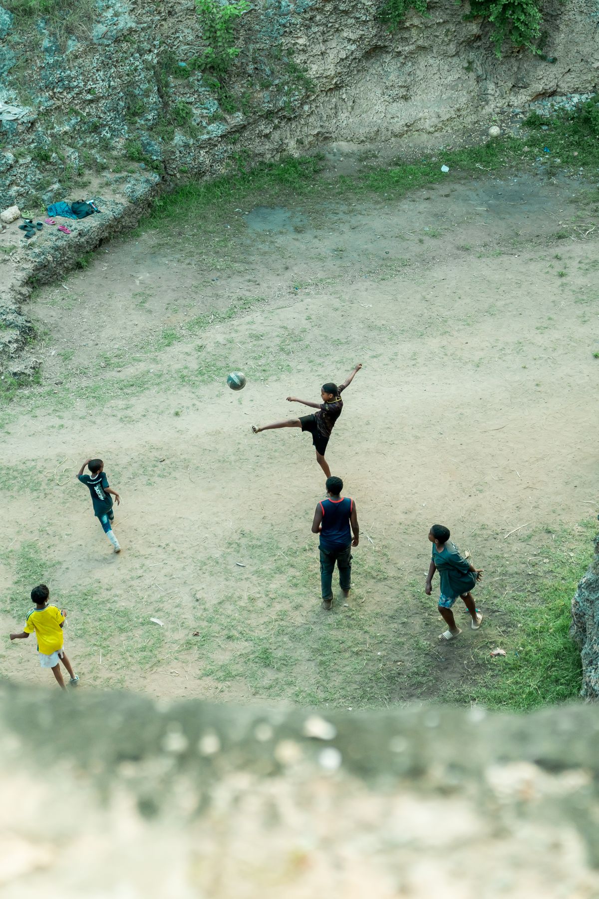 Boys playing football, Mombasa, Kenya